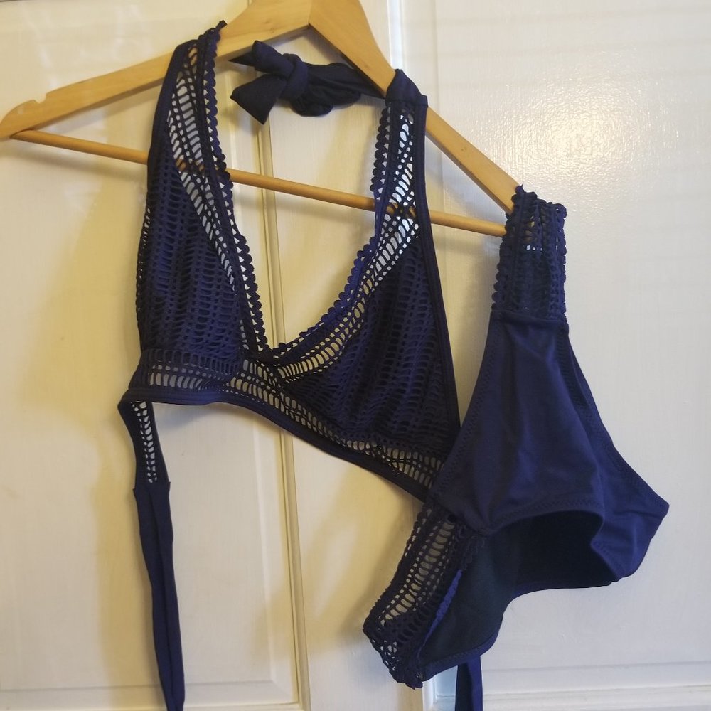 Navy blue crochet accent bathing suit. Never worn.